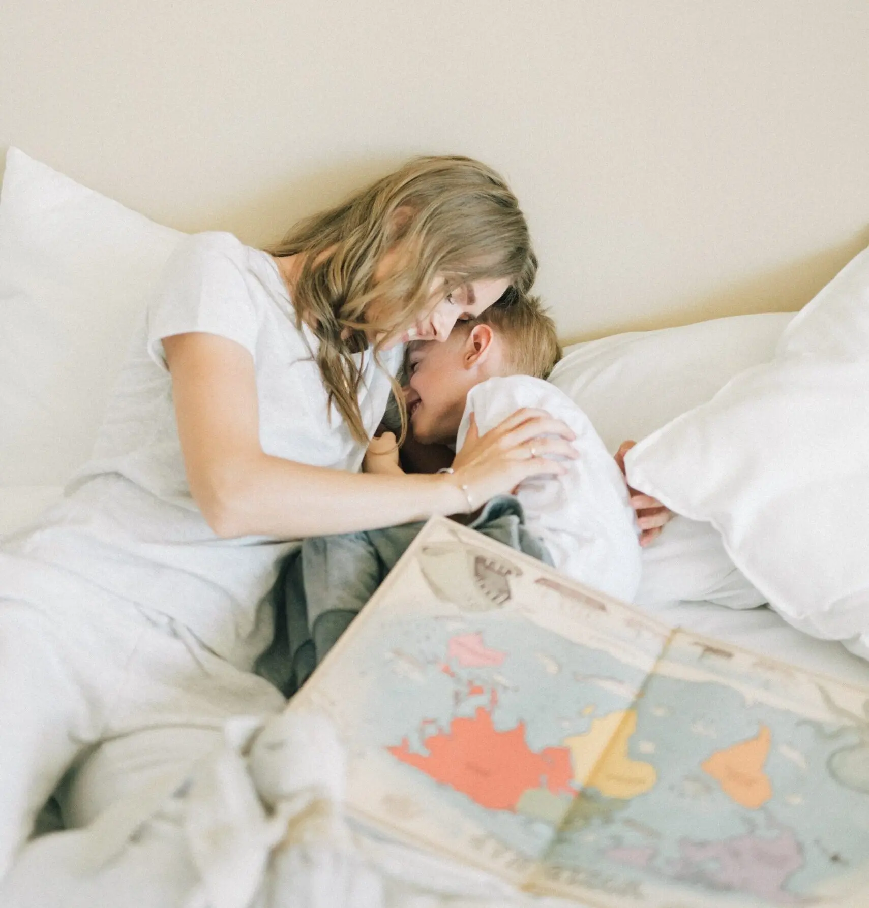 Mom playing with her son in a comfortable space